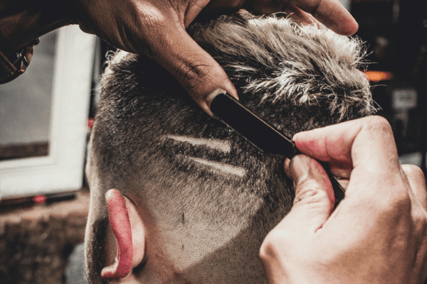 Men’s grooming tools and a closely trimmed beard